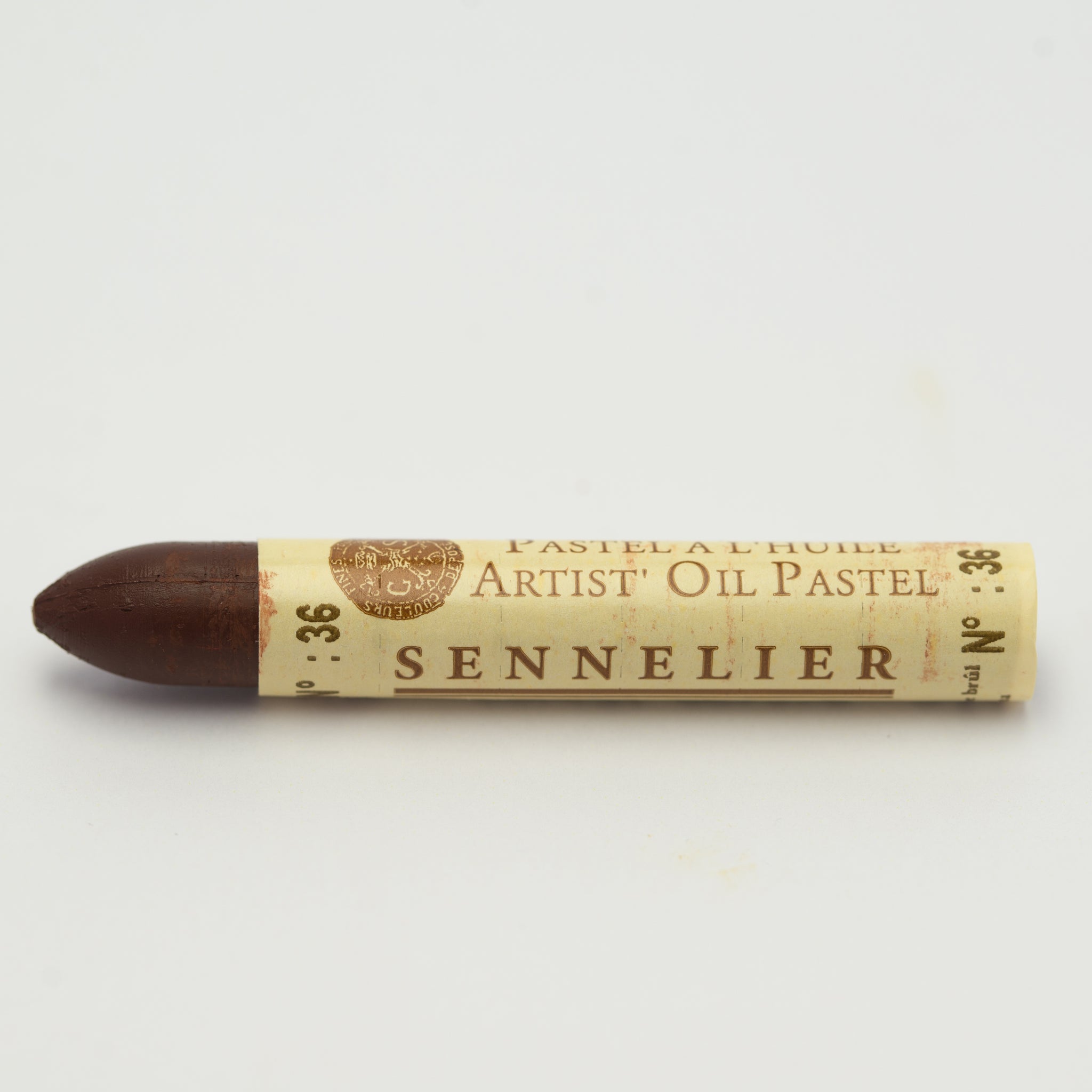 A single Sennelier oil pastel crayon against a white background, displaying the brand name and the words 'Artist Oil Pastel' on the wrapper.
