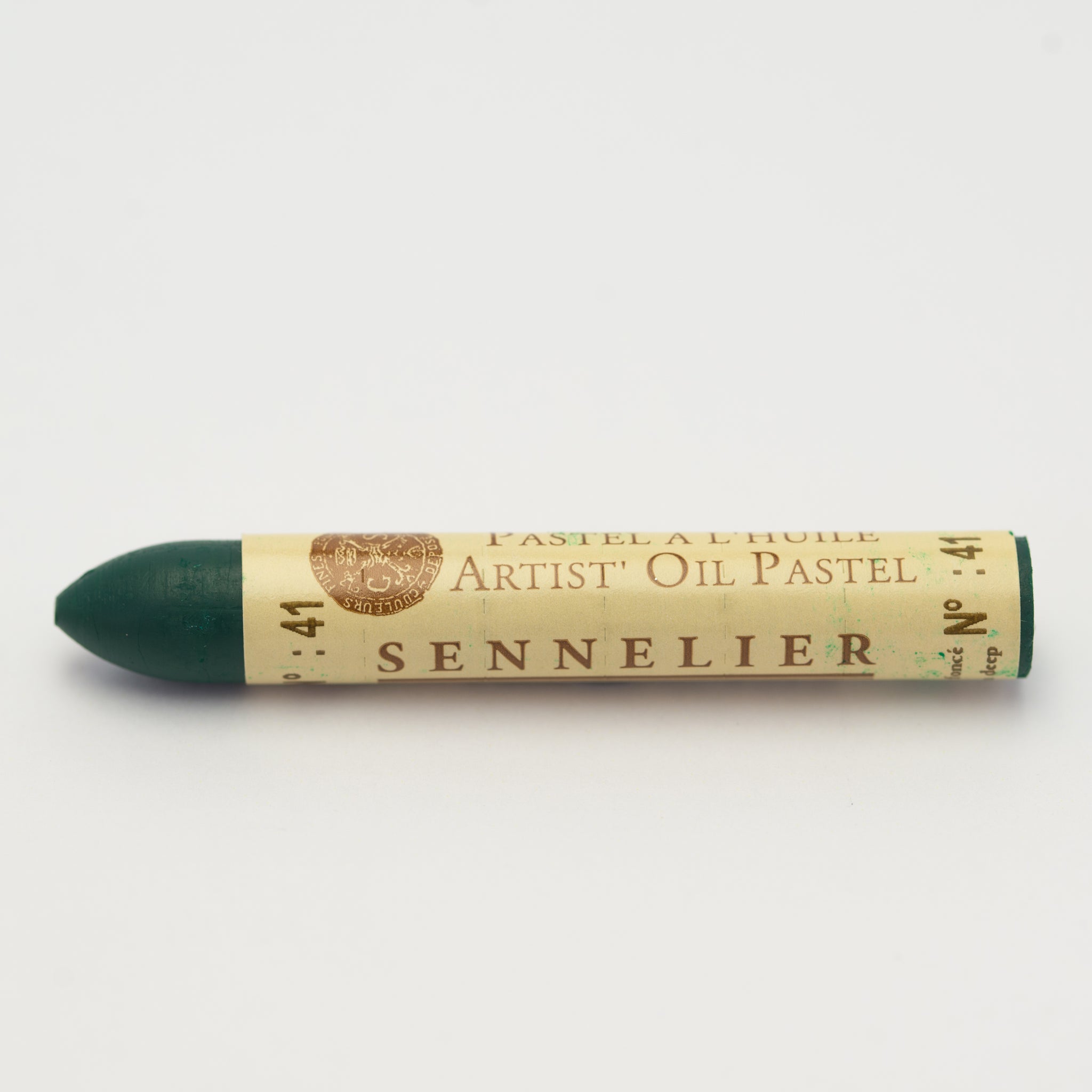 A single Sennelier oil pastel crayon against a white background, displaying the brand name and the words 'Artist Oil Pastel' on the wrapper.