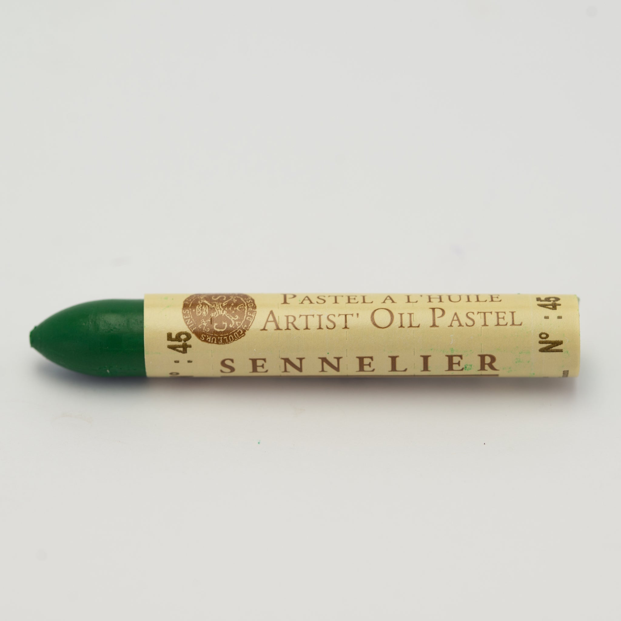 A single Sennelier oil pastel crayon against a white background, displaying the brand name and the words 'Artist Oil Pastel' on the wrapper.