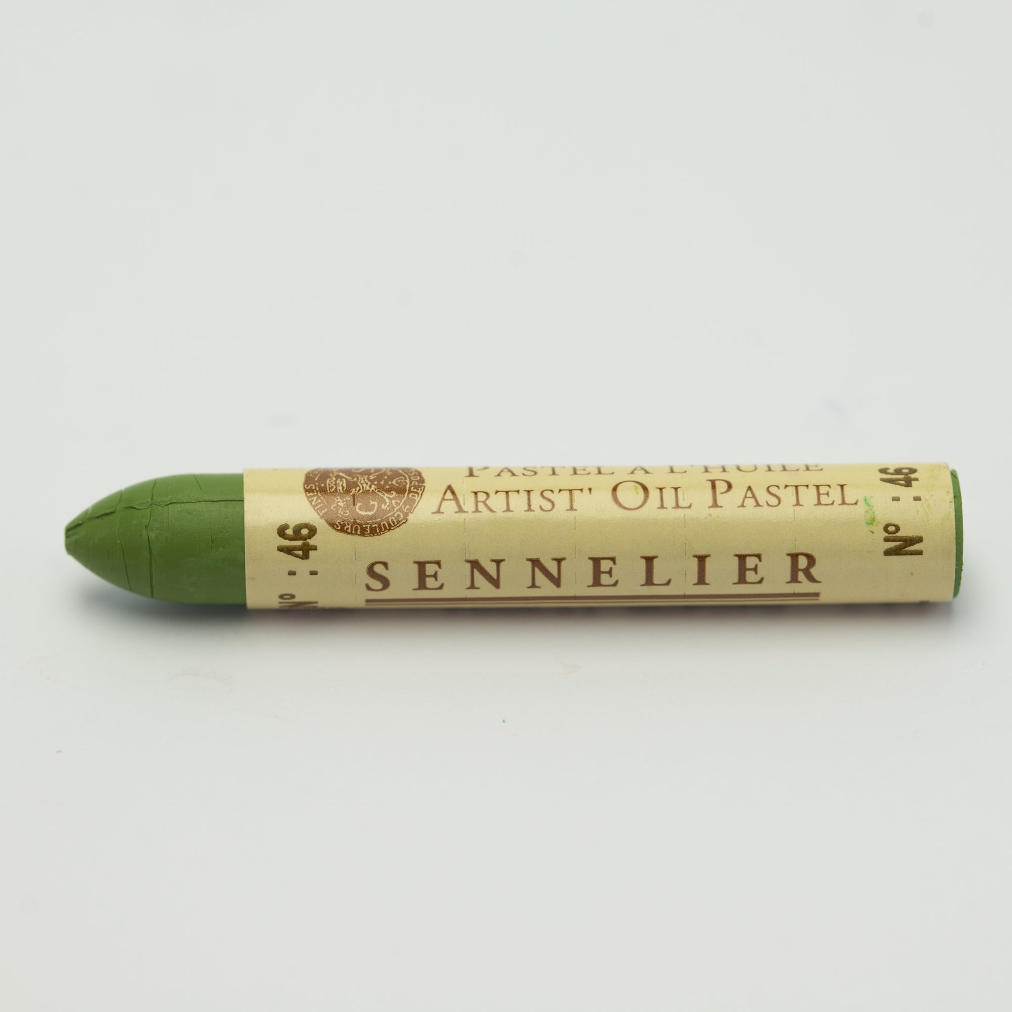 A single Sennelier oil pastel crayon against a white background, displaying the brand name and the words 'Artist Oil Pastel' on the wrapper.