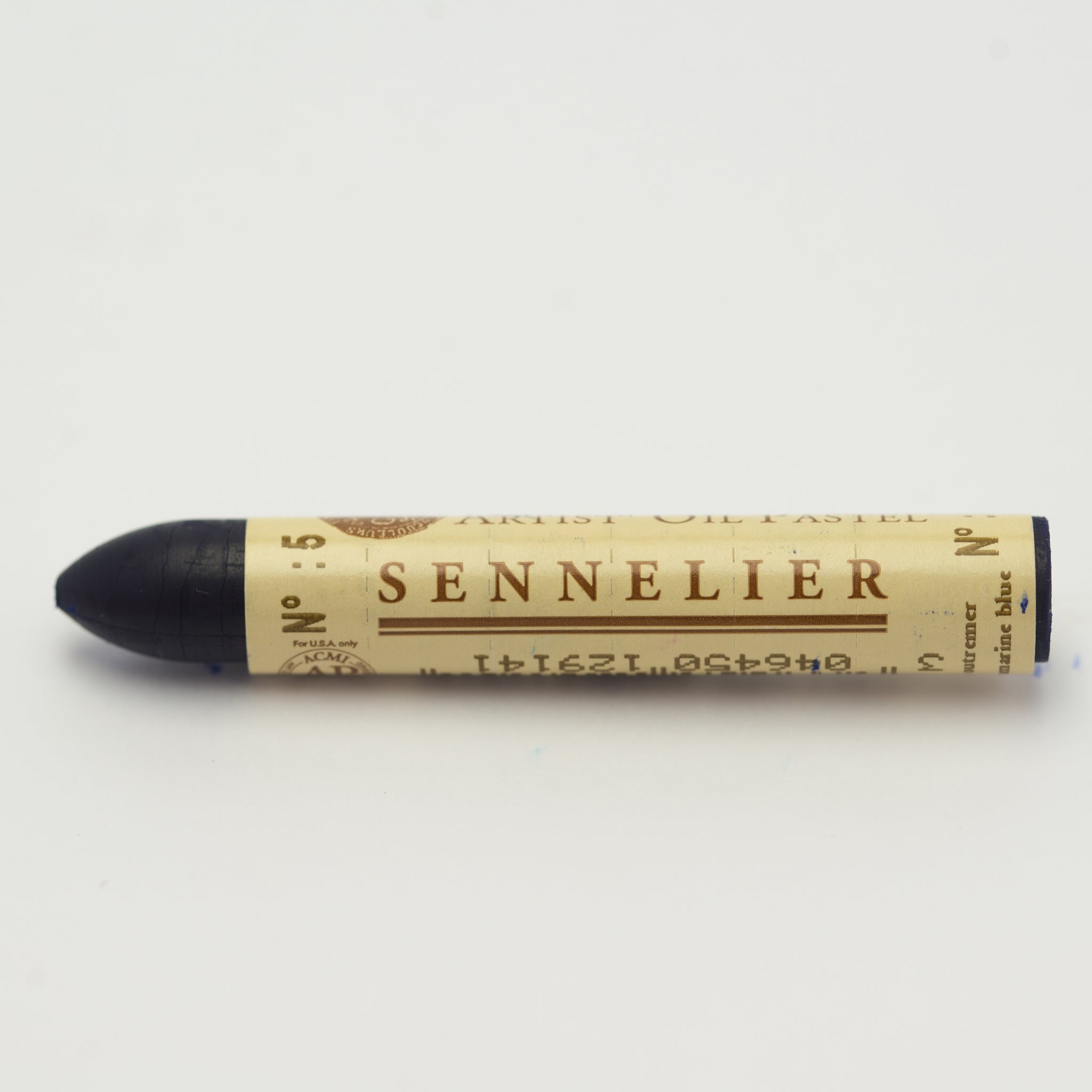 A single Sennelier oil pastel crayon against a white background, displaying the brand name and the words 'Artist Oil Pastel' on the wrapper.