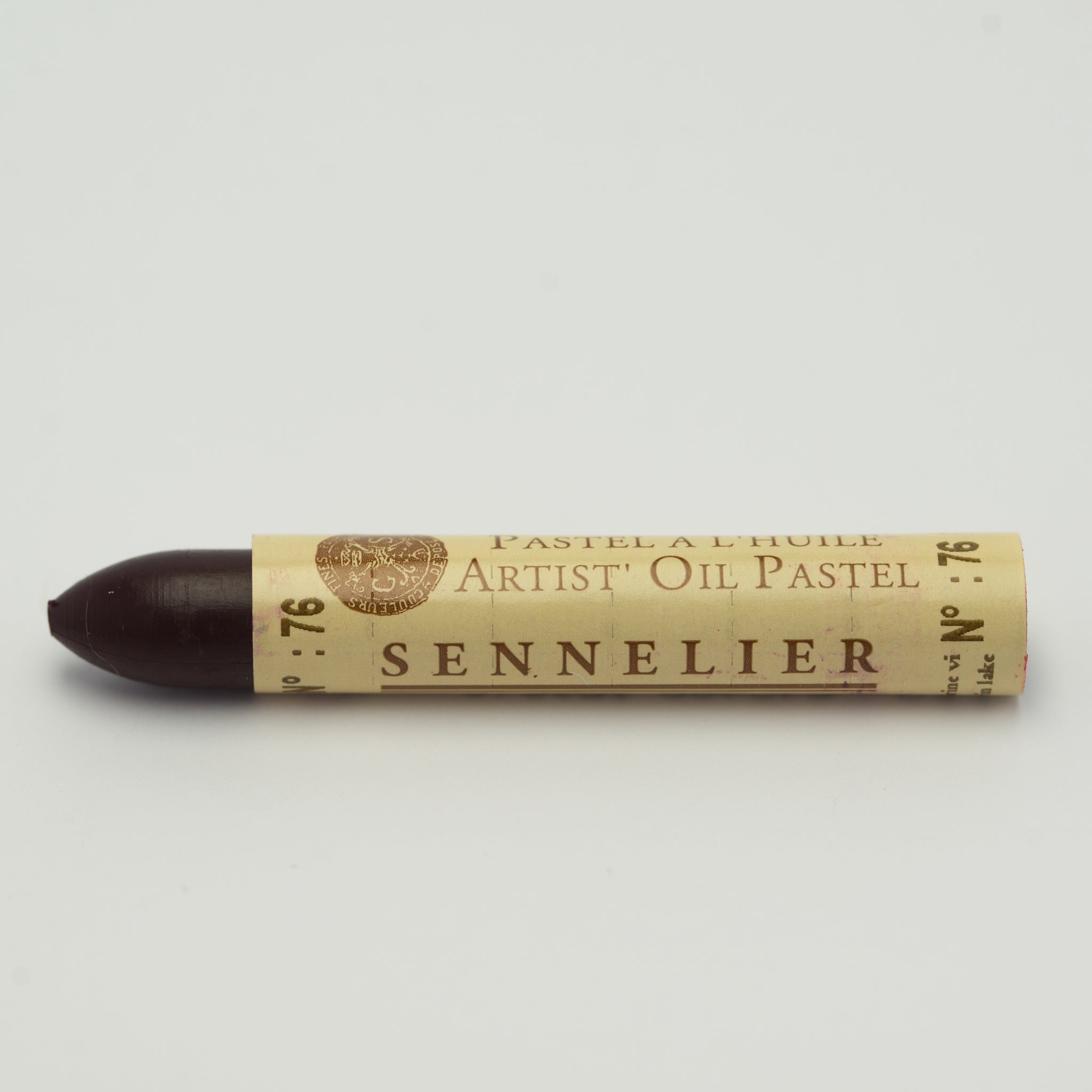 A single Sennelier oil pastel crayon against a white background, displaying the brand name and the words 'Artist Oil Pastel' on the wrapper.