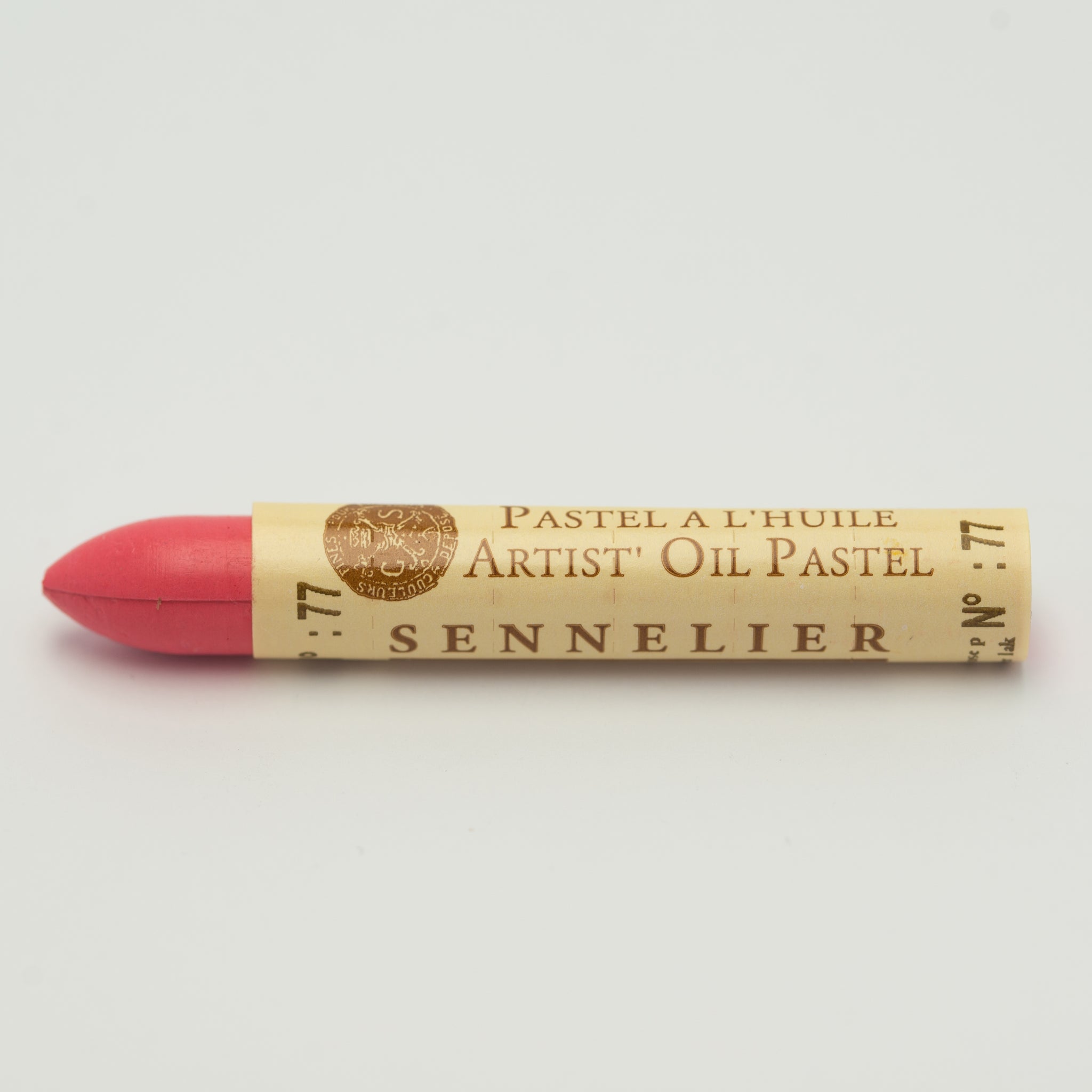 A single Sennelier oil pastel crayon against a white background, displaying the brand name and the words 'Artist Oil Pastel' on the wrapper.