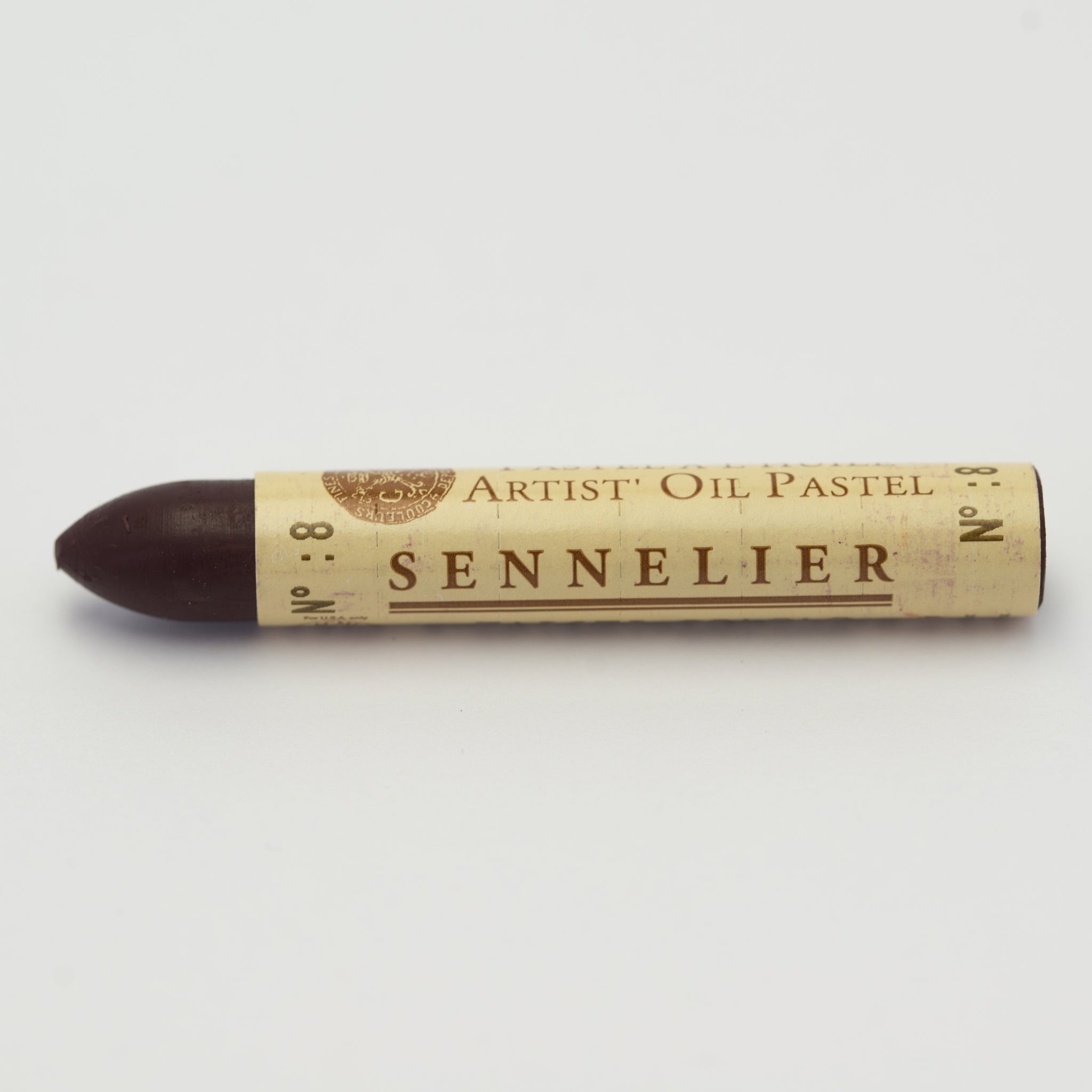 A single Sennelier oil pastel crayon against a white background, displaying the brand name and the words 'Artist Oil Pastel' on the wrapper.