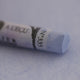 A close-up of a blue Sennelier extra soft pastel on the same coloured background, with the colour information printed on the paper wrap.