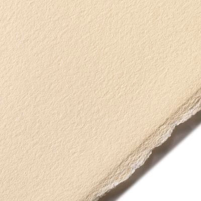 A close-up image of a piece of BFK Rives printmaking paper in a cream colour, showing its texture and deckle edge.