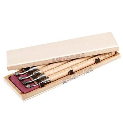 A set of four Arteina roulettes with beechwood handles and steel tips, displayed in an open wooden box with a red cloth.