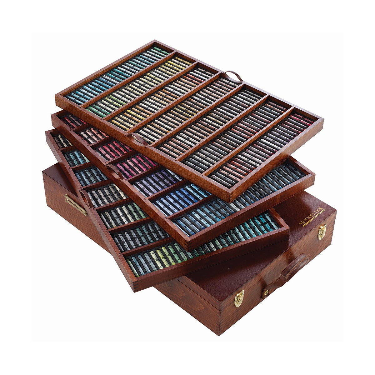 3 wooden trays of pastels of varying colours displayed atop a wooden box with leather handle on a white background.