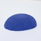 A half egg shaped pastel in a bright blue tone, sitting on a white background