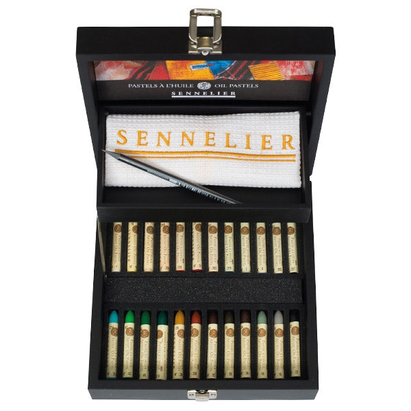 A set of 24 Sennelier oil pastels  in various colours and accessories, displayed in a black wooden box.