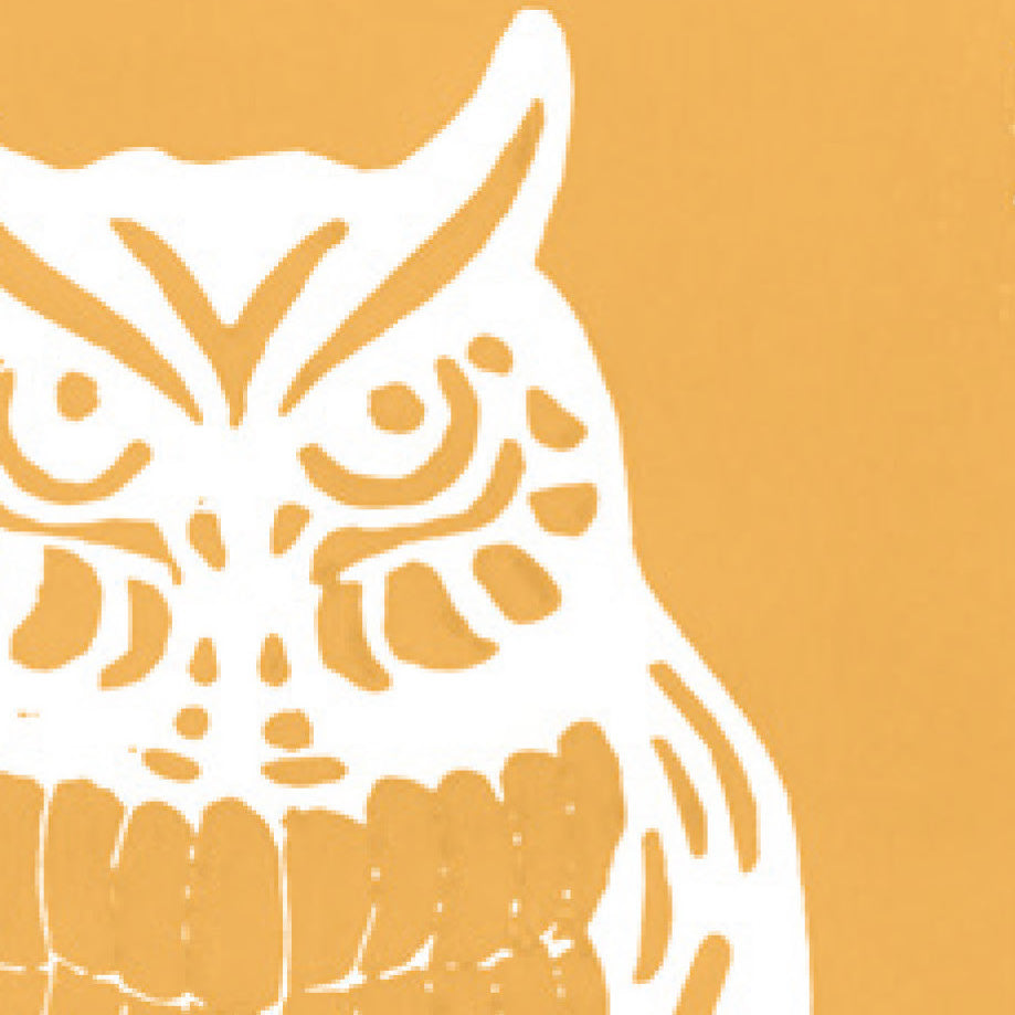 A printed linocut of an owl in yellow/brown ink with the outline of the owl appearing in white.